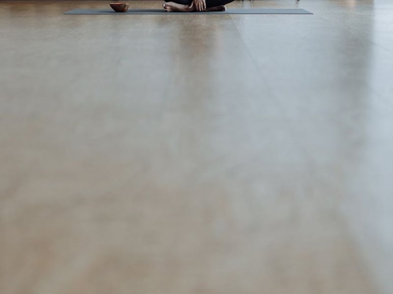 Minimalist yoga studio with natural wood and plants